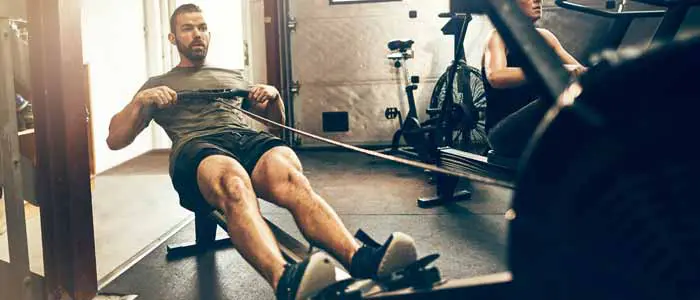 Man on rowing machine