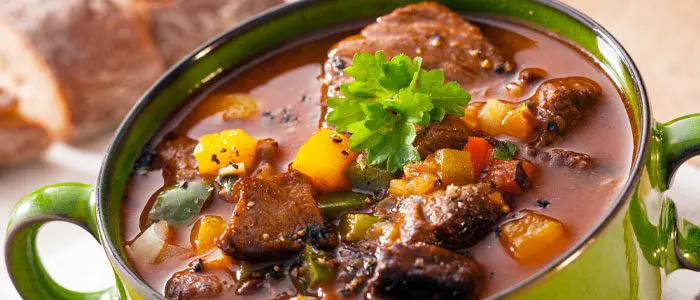 pot of winter beef stew and vegetables