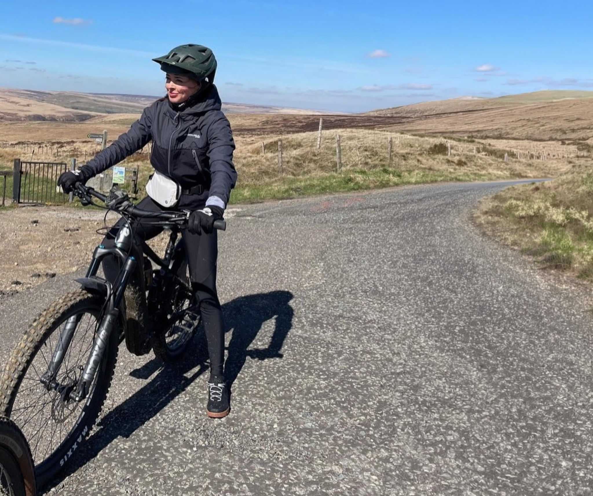 Christie Johnston cycling in the country